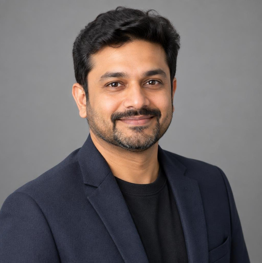 South Asian man, lead production consultant, studio portrait